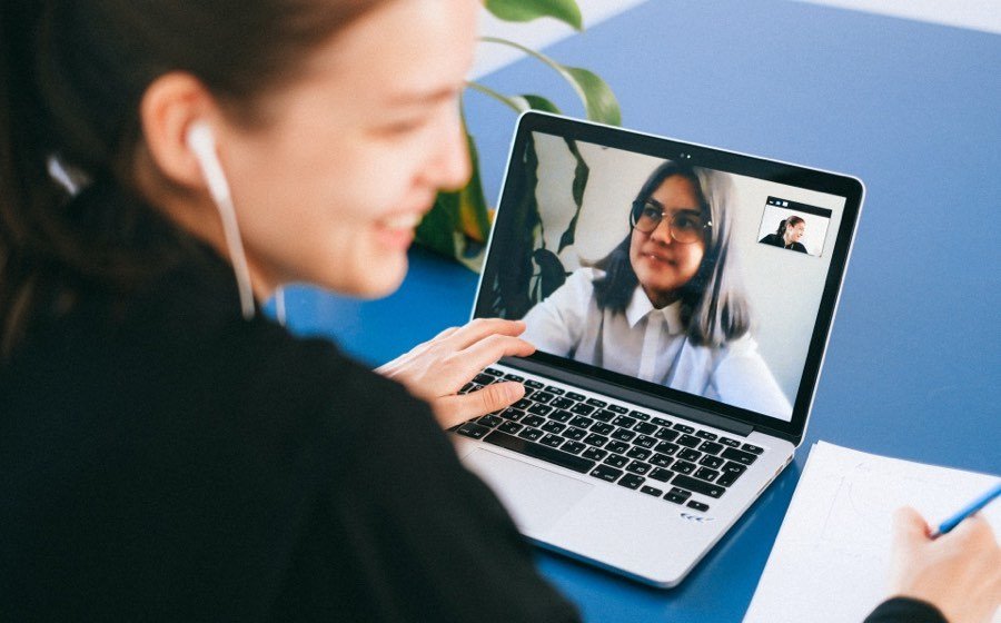 Two young women on a video interview